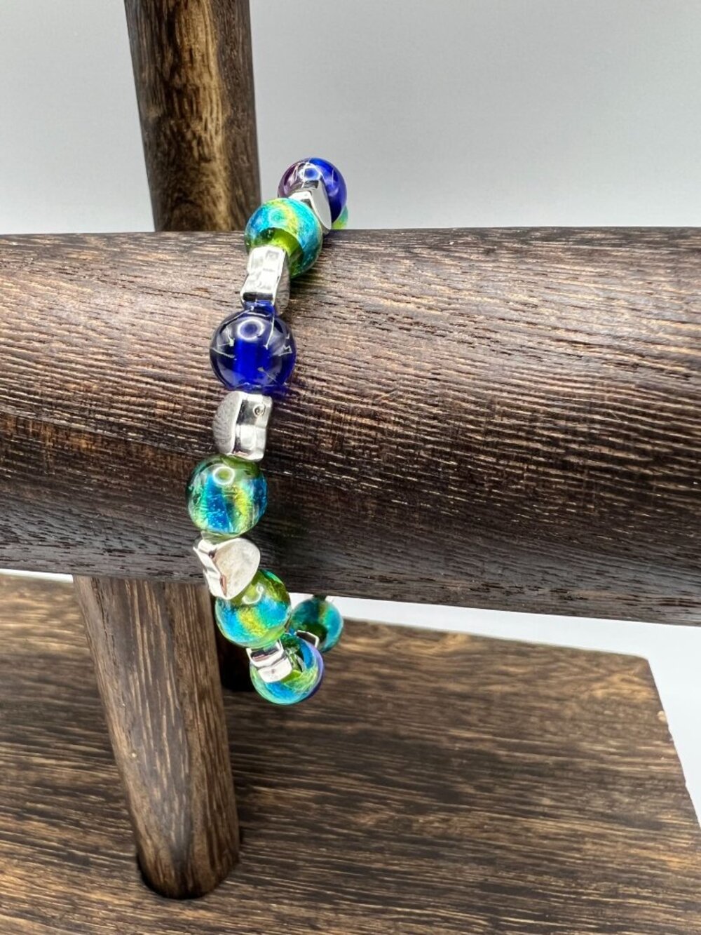 Glass Bead Bracelet With Silver-Tone Heart Accents Stretch Fit Blue & Green Irid